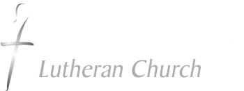 Shepherd of the Valley Lutheran Church logo - white and grey